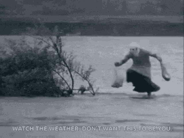 in-rain-skip.thumb.gif.d34492596811ab37ba2e59a7bd3a7e1d.gif